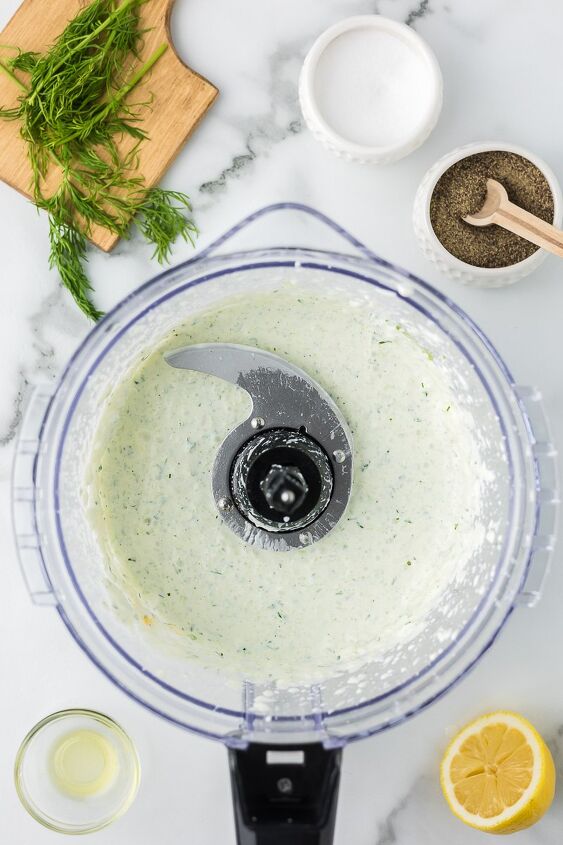 easy tzatziki sauce with sour cream, Tzatziki sauce in the bowl of a food processor
