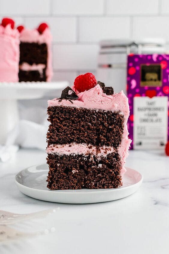 raspberry chocolate layer cake for two, Slice of raspberry chocolate layer cake on a small white plate