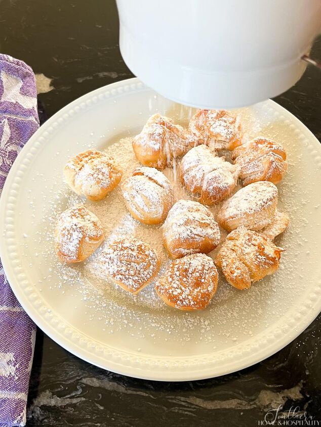 new orleans biscuit beignet recipe it s big easy air fryer fast, Sifting powdered sugar over fried beignets