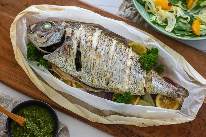 whole fish en papillote, Fish en papillote served on a platter