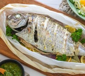whole fish en papillote, Whole cooked fish served on a platter