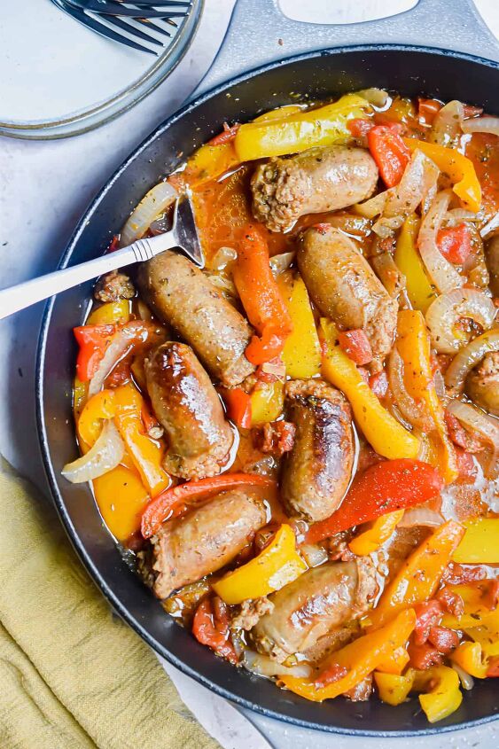 one pot sausage and peppers, A close up shot of the one pot sausage and peppers with a fork in the pan