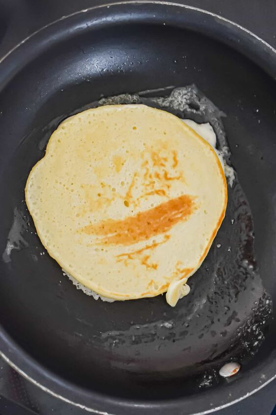 fluffy pancakes with cake flour, The pancake is flipped in a pan