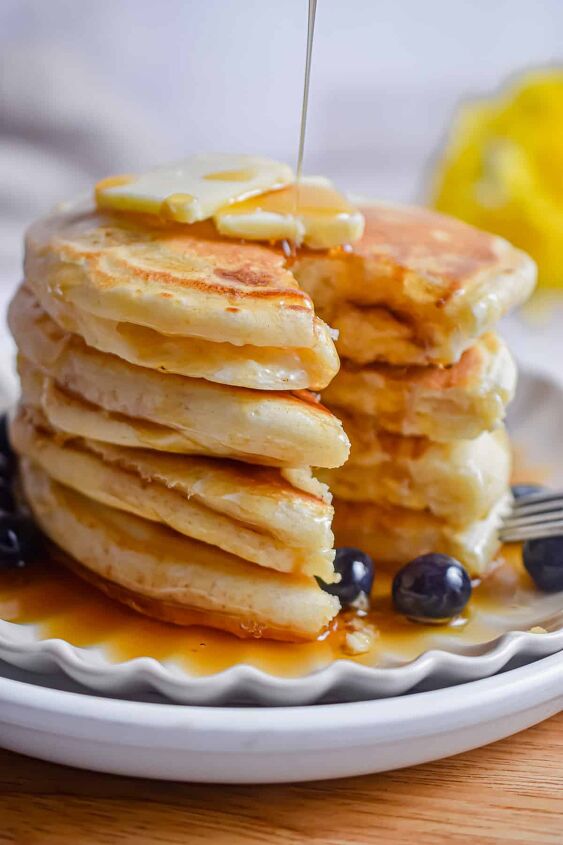 fluffy pancakes with cake flour, A portion of the pancakes with cake flour is cut out of the stack