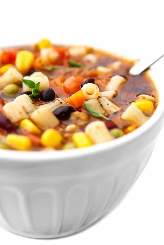 vegan minestrone soup, A white bowl filled with veggie packed minestrone soup