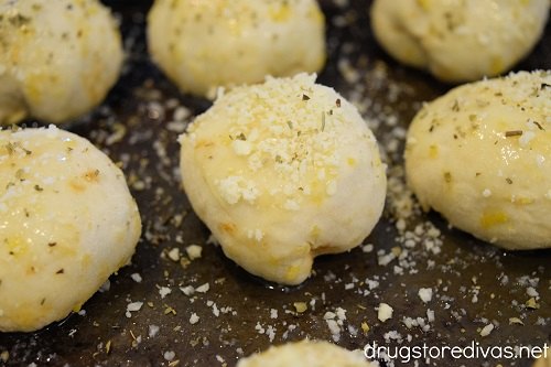 Dough balls with parmesan and cheese on top