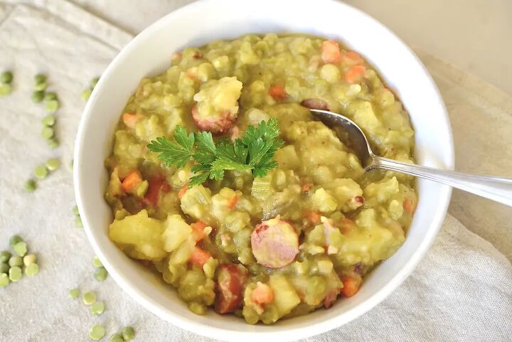authentic german split pea soup erbsensuppe, bowl of german pea soup with spoon