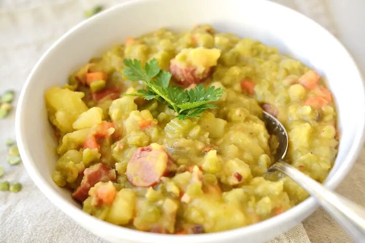 authentic german split pea soup erbsensuppe, bowl with German split pea soup and spoon