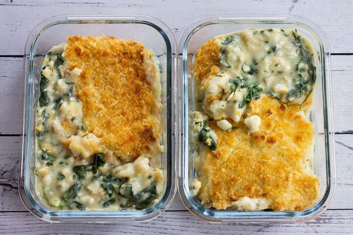 easy creamy fish pie with spinach, fish pie in containers ready to be frozen