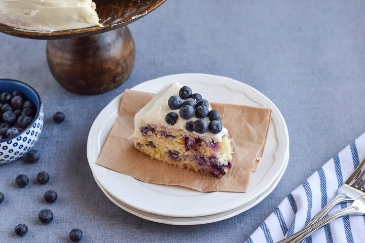 gluten free lemon blueberry cake, Gluten Free Lemon Blueberry Cake with one slice on white plate