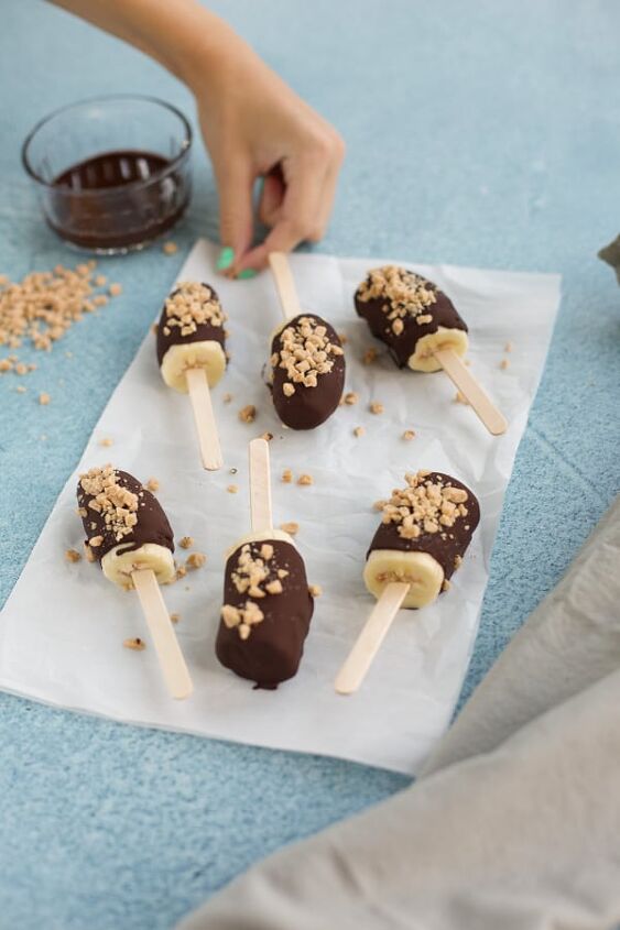 chocolate banana popsicles, chocolate banana popsicles on parchment paper