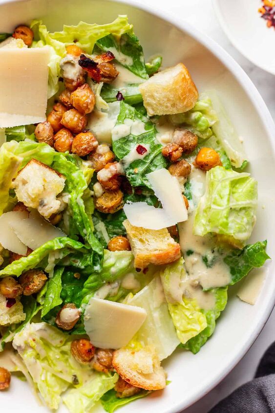 crowd pleasing vegan caesar salad you won t believe it s dairy free, Healthy vegan Caesar salad drizzle with Tahini dressing and topped with croutons and crispy chickpeas
