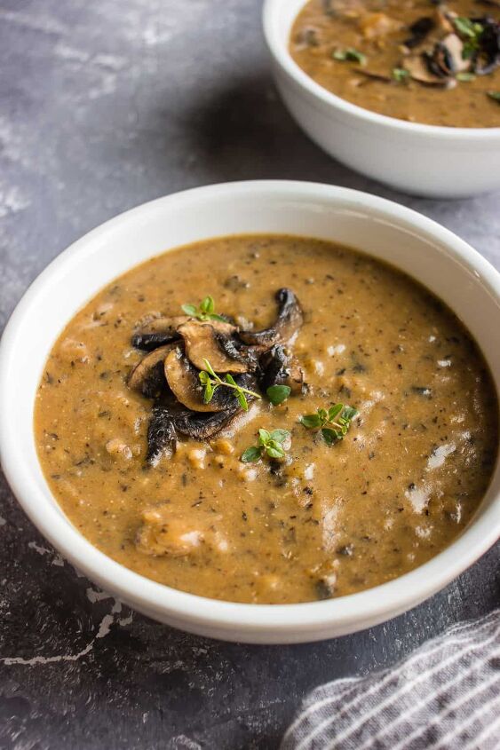 hearty vegan cream of mushroom soup with coconut milk, Vegan mushroom soup with some mushrooms on top