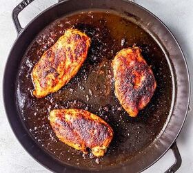 blackened chicken tacos with mango salsa, Blackened chicken being cooked in a cast iron skillet