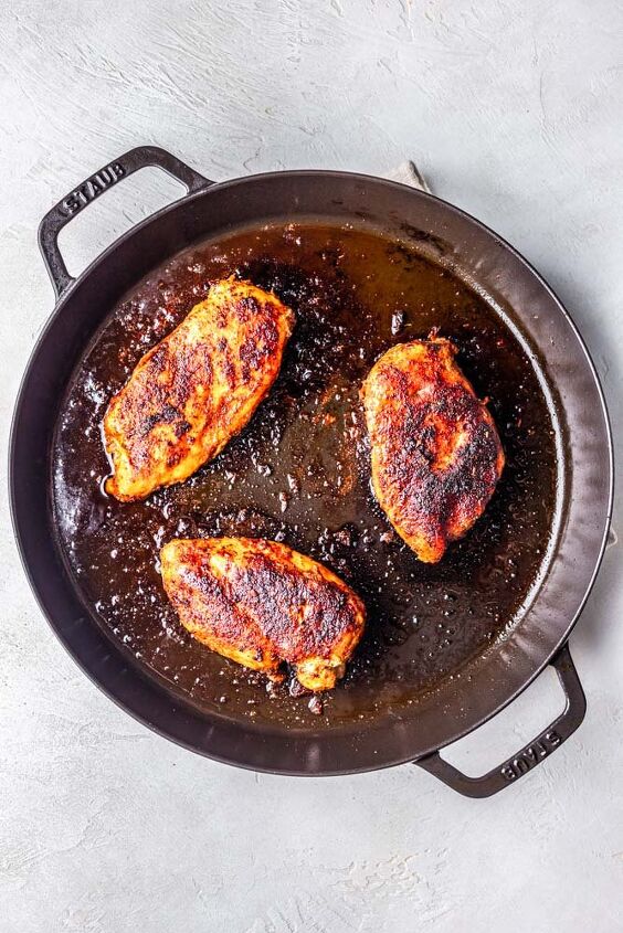 blackened chicken tacos with mango salsa, Blackened chicken being cooked in a cast iron skillet