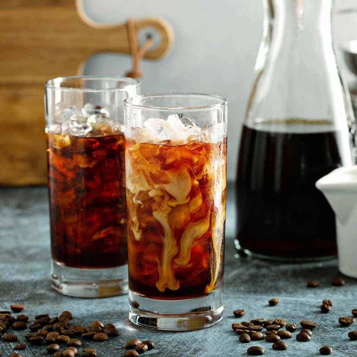 iced coffee liquid concentrate, A bottle of liquid coffee concentrate and two glasses of iced coffee