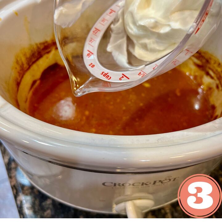 creamy crockpot chicken and salsa, Add your Greek yogurt into your crockpot with the Salsa sauce
