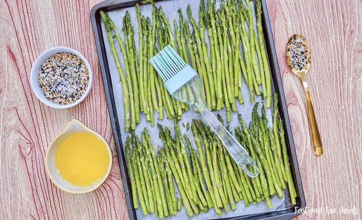 sheet pan asparagus with everything bagel seasoning, Coating the asparagus sheet pan with butter