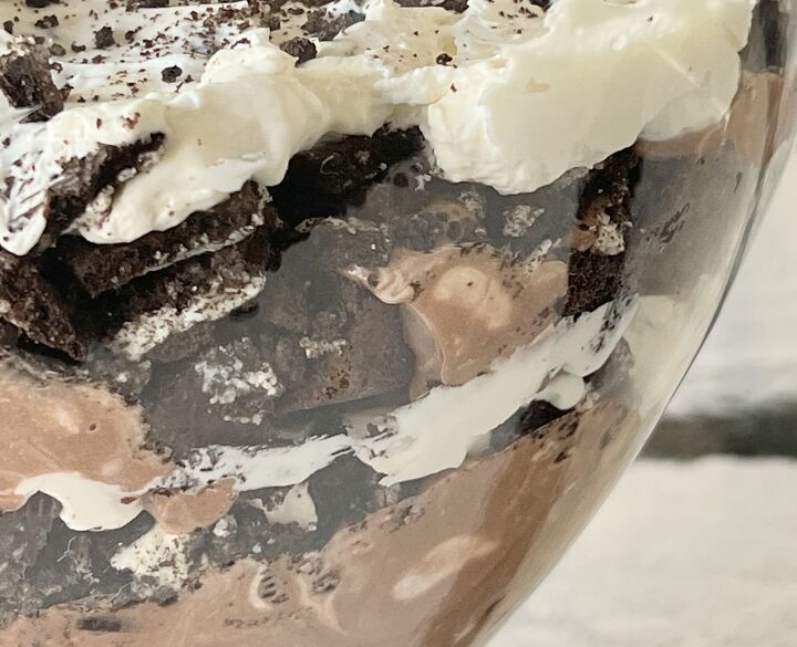 how to make a melt in your mouth chocolate trifle, The four intermingling layers of the chocolate trifle include brownies crushed sandwich cookies a cream cheese mixture and a pudding mixture
