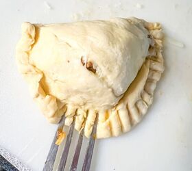 easy air fryer beef empanadas recipe, Seal the edge of the crescent roll dough with a fork to make Easy Beef Empanadas