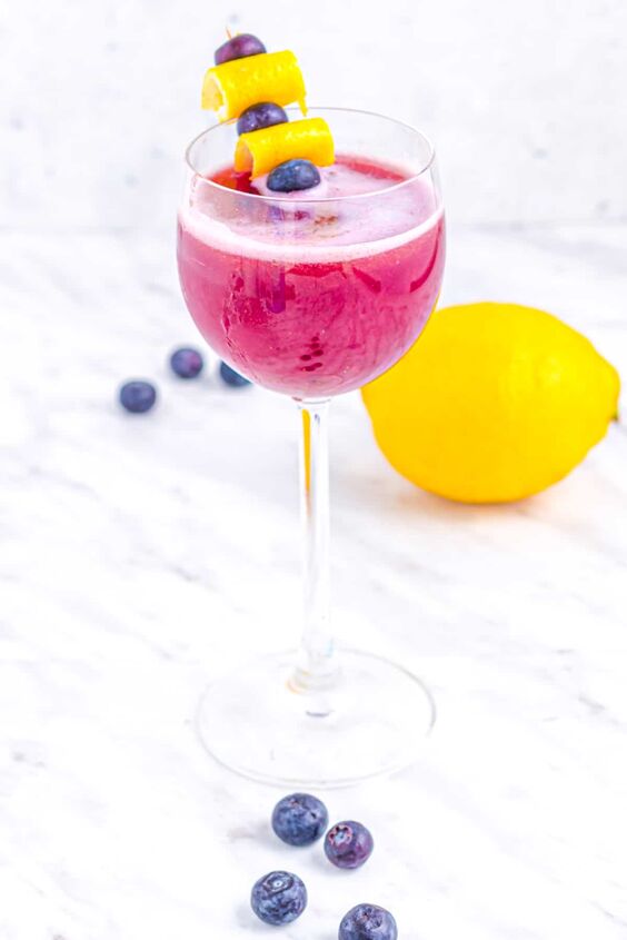 blueberry gin sour cocktail, Blueberry cocktail with lemon and blueberries