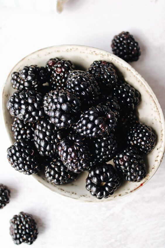 blackberry simple syrup, fresh blackberries in a white bowl