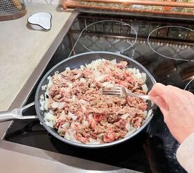 Add ground beef to cooked onions and cook until beef is browned Drain liquid before adding to slow cooker