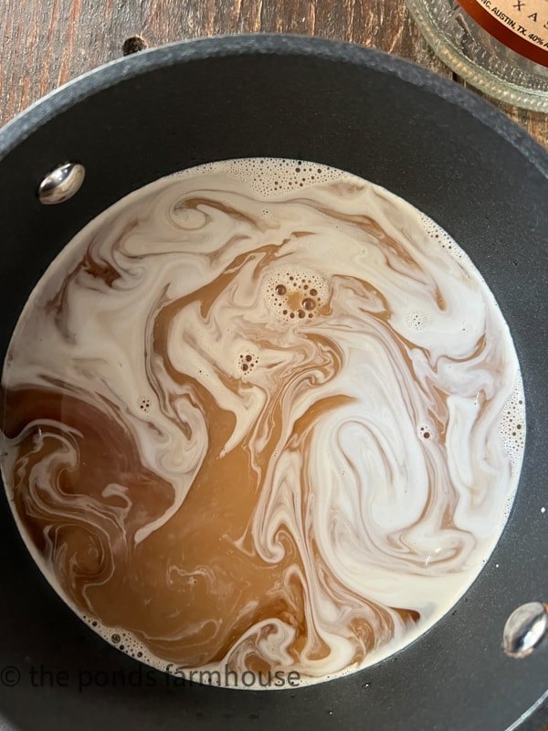 Hot White Russian mixed in sauce pan and heated before serving