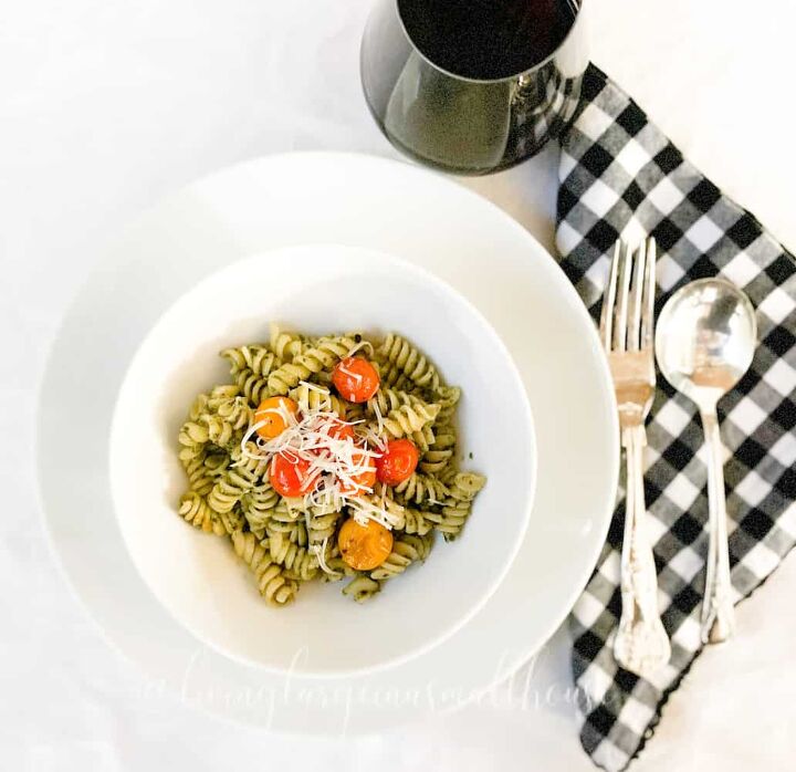 the best traditional italian pasta sauce, table set with bowl of roasted cherry tomato pesto pasta