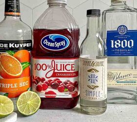 Ingredients needed to make a cranberry margarita tequila cranberry juice triple sec limes and simple syrup