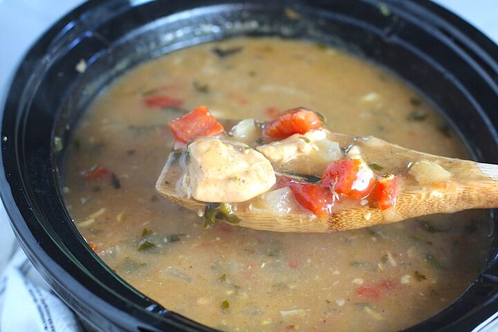 brazilian coconut chicken stew ensopado, Brazilian Coconut Chicken Stew in a slow cooker with a spoon scooping some up It s an easy family dinner It s has chicken thighs tomatoes lime cilantro and more Cook in a slow cooker or on the stove