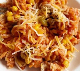 experience the pleasure of cooking authentic mexican rice, Mexican rice close up with cheese sprinkled on top