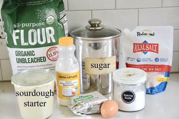 easy sourdough irish soda bread, flour sugar salt sourdough starter buttermilk butter egg baking soda on kitchen counter