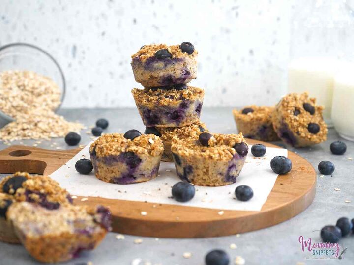 healthy oats and chia seed muffins with blueberries, Healthy Oats and Chia Seed Muffins with Blueberries with 2 glasses of milk in the background