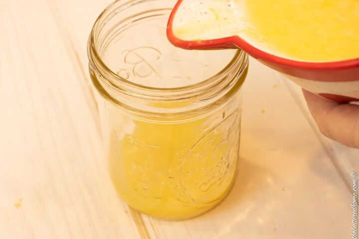 pressure cooker lemon curd, pouring lemon curd mixture into jar