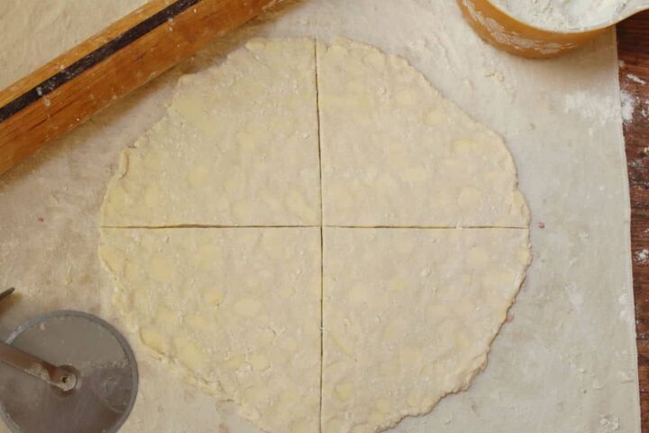 butterhorn recipe with cottage cheese, A pastry dough is cut into quarters with a pizza cutter