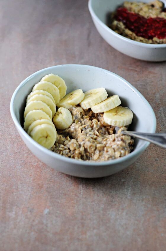 peanut butter overnight oats, peanut butter and banana overnight oats in a bowl with a P B J overnight oats behind it