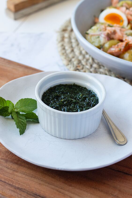 homemade mint sauce recipe, homemade mint sauce in a white dish on table
