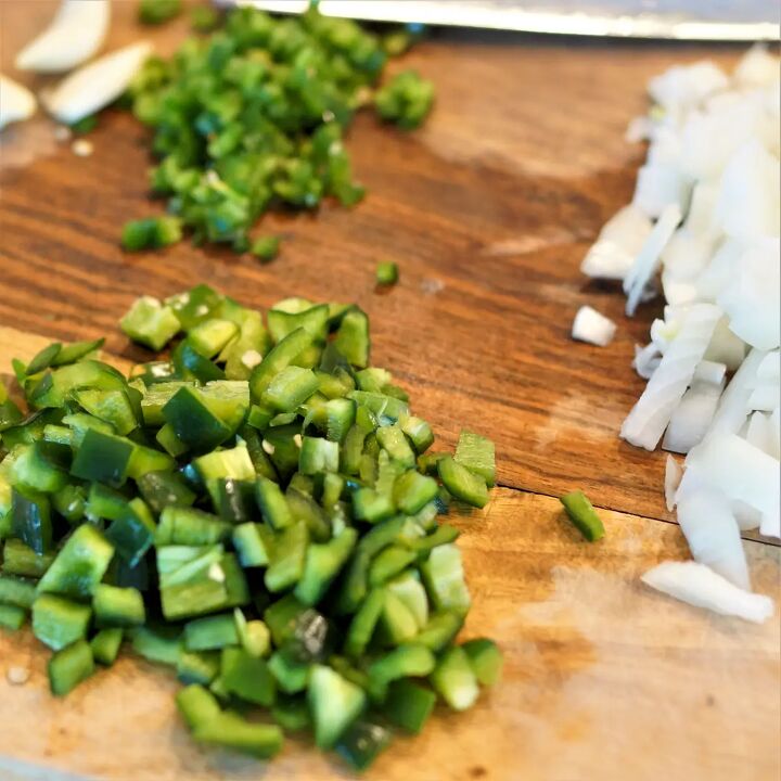 dutch oven white chicken chili, Peppers and onions diced on a cutting board