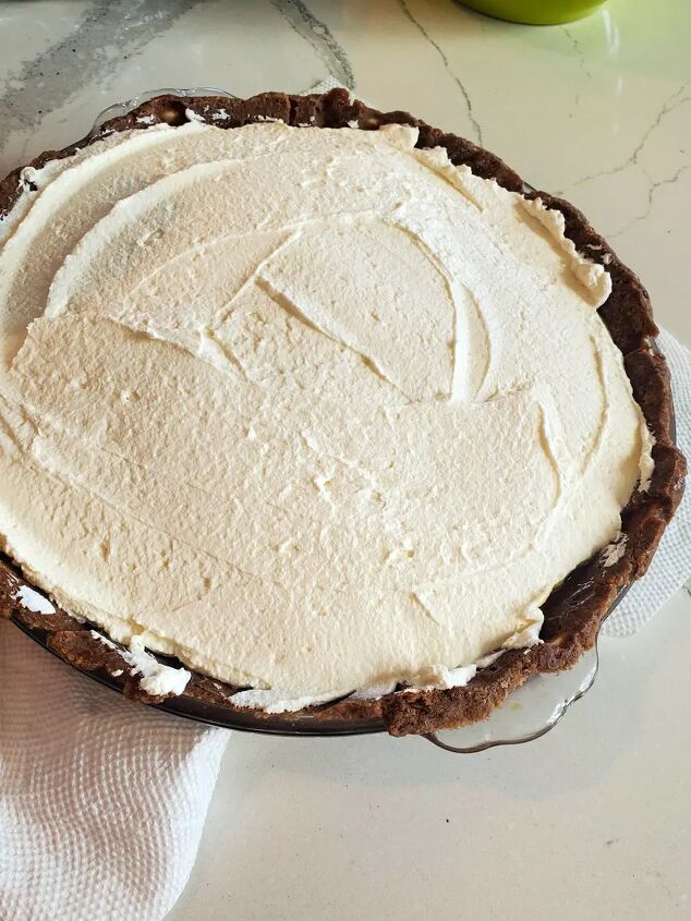 samoas coconut cream pie, Coconut flavored whip cream topping a coconut cream pie