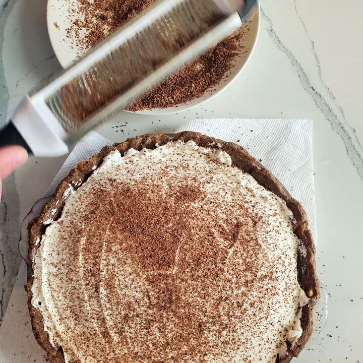 samoas coconut cream pie, Grated bittersweet chocolate being added to a coconut cream pie