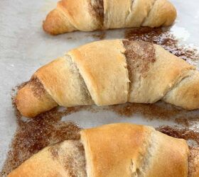 crescent roll cinnamon rolls, Baked crescent rolls on a baking sheet showing cinnamon that baked out
