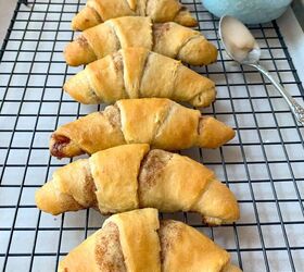 crescent roll cinnamon rolls, Baked rolls on a wire cooling rack with a bowl of icing next to it