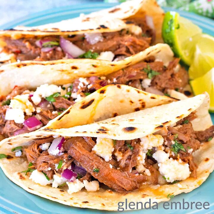 slow cooker pork carnitas, Mexican Street Tacos on a blue stoneware plate