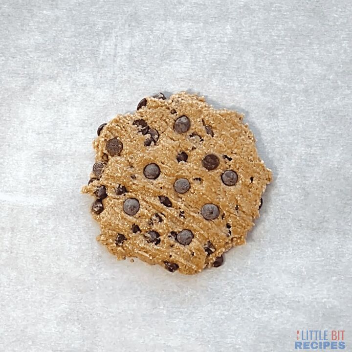 healthy single serve cookie vegan, unbaked single serve cookie on parchment paper