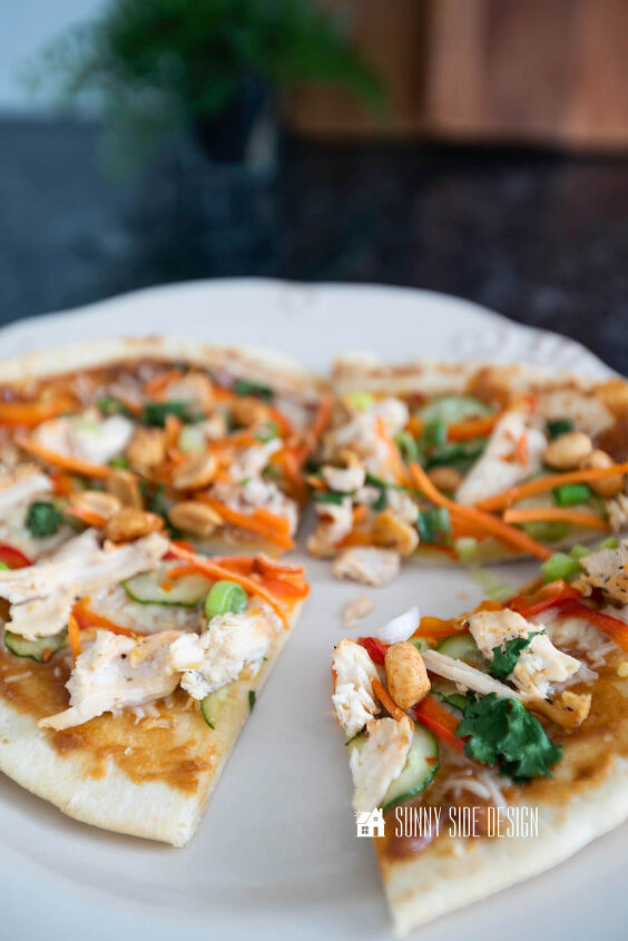 easy thai chicken pizza with peanut sauce, Cooked Thai Chicken Pizza with a Peanut sauce served on a plate