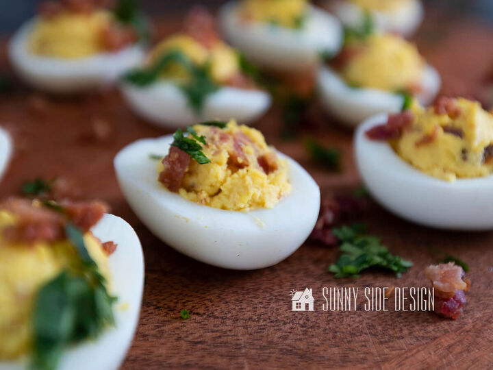 The best deviled eggs recipe garnished with cilantro and bacon