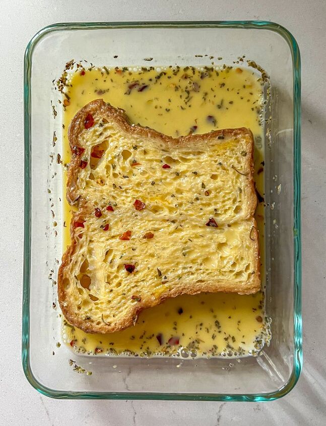 savory croissant french toast quick and easy, Croissant toast soaking in egg mixture to make french toast