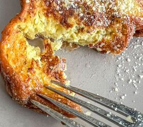 savory croissant french toast quick and easy, Fork cutting into a slice of croissant french toast