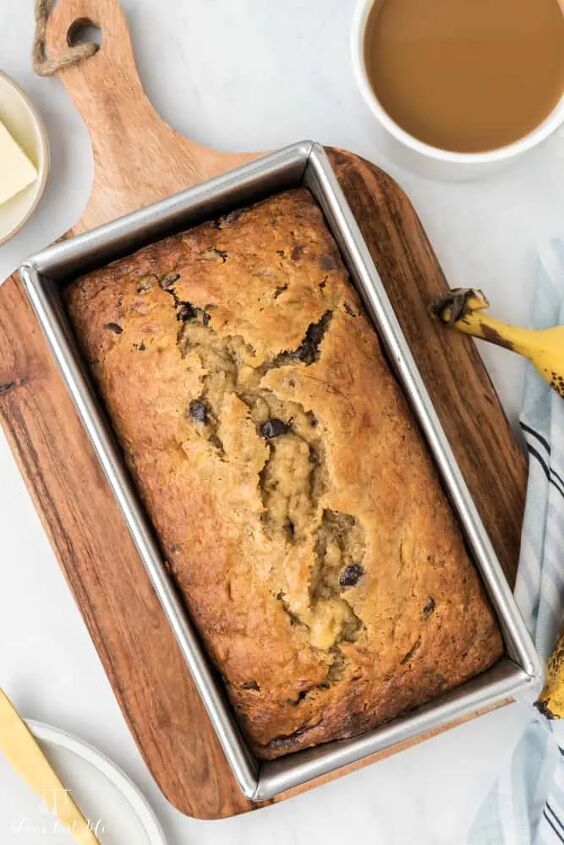 4 ingredient banana bread with chocolate chunk muffin mix, A loaf of banana bread on a cutting board